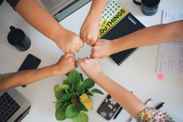 team leadership, hands together